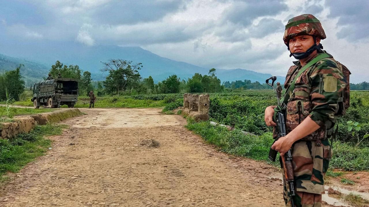 Security personnel patrol the violence-hit area of Irengbam village of Bishnupur district, in Manipur, Monday, June 19, 2023. Credit: PTI Photo