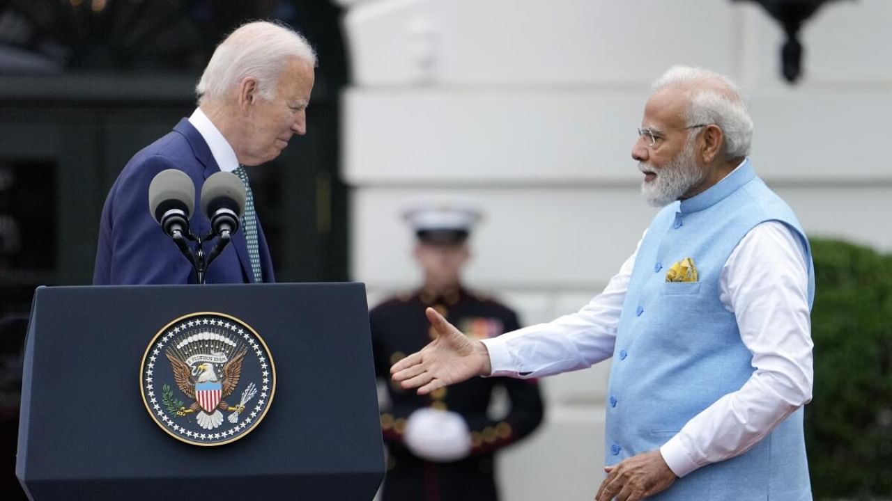 Prime Minister Narendra Modi with US President Joe Biden at the White House. Credit: PTI Photo