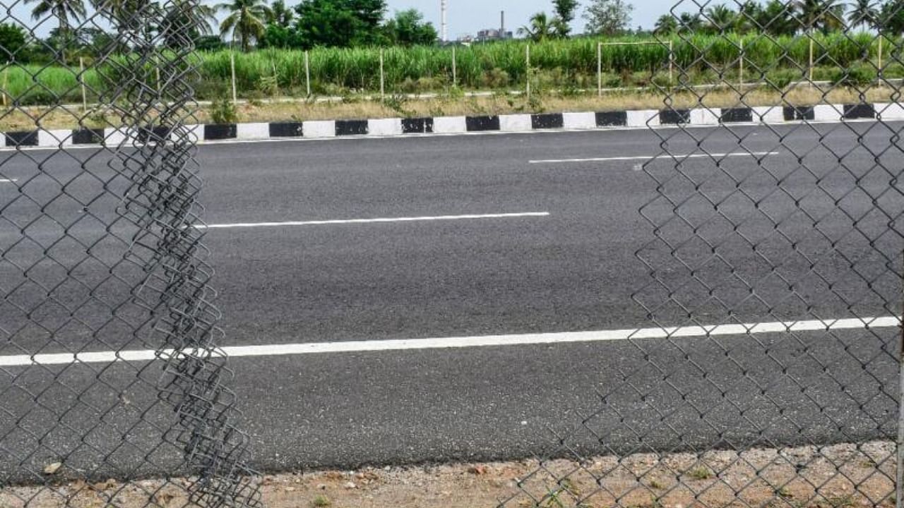 A damaged wire mesh fence near Sundahalli on Mysuru-Bengaluru Expressway in Mandya district. Credit: DH Photo/D V Dhanush