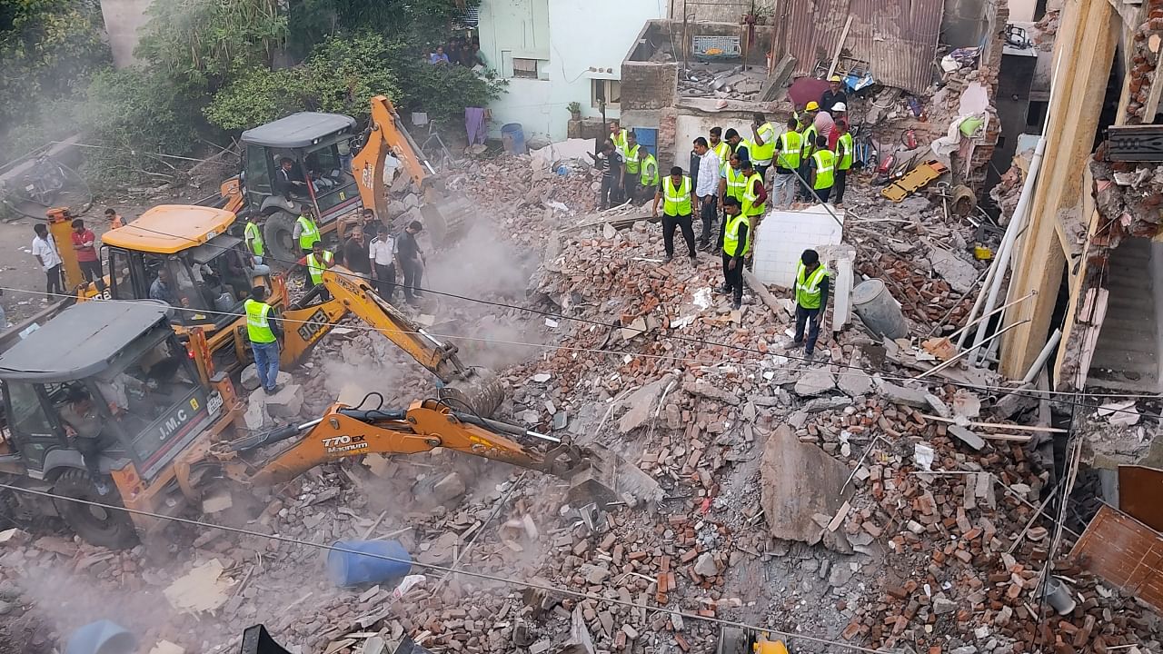 Rescue operation underway after a three-storey building collapses in Jamnagar, Friday, June 23, 2023. Credit: PTI Photo