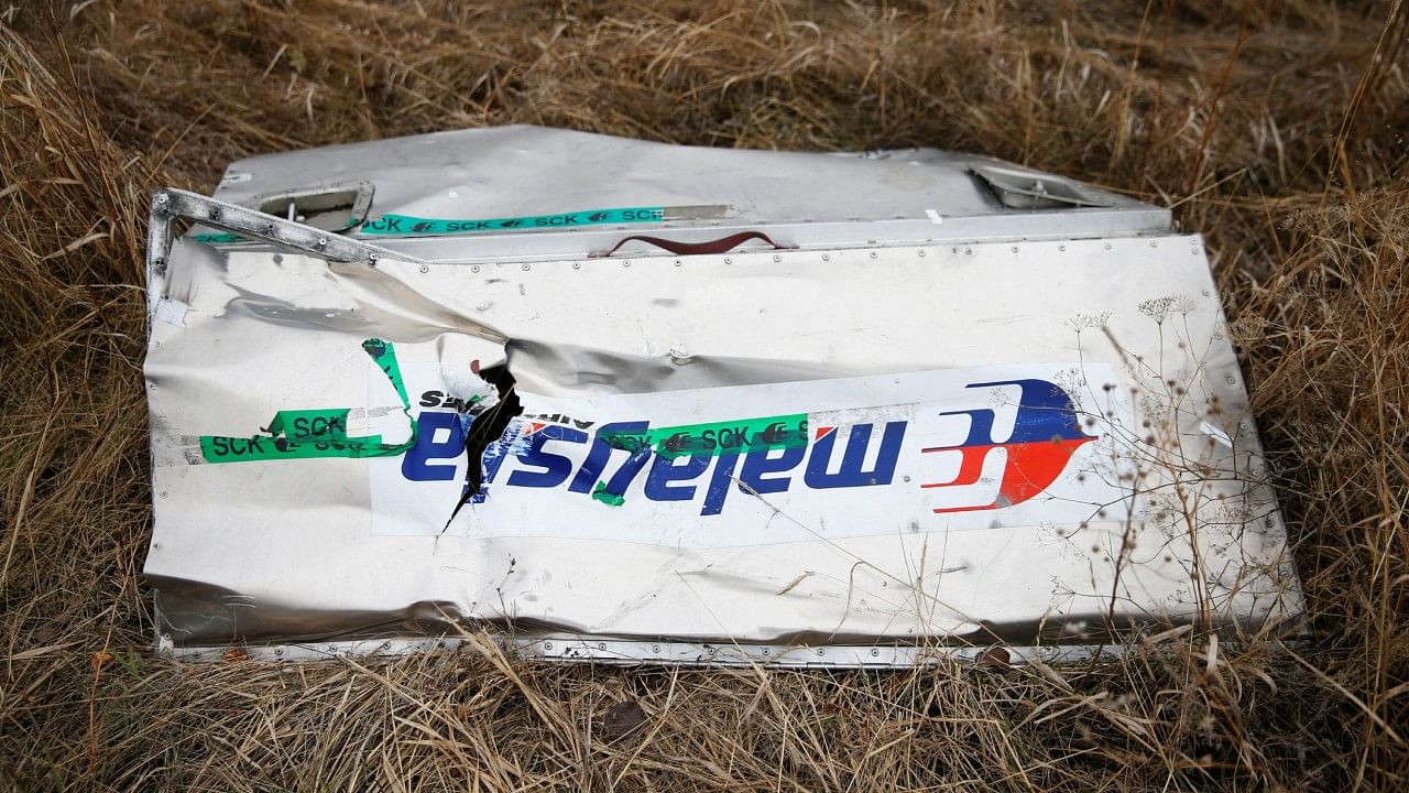 A part of the wreckage of the downed Malaysia Airlines Flight MH17 is seen at its crash site near the village of Grabovo, Donetsk region. Credit: Reuters File Photo