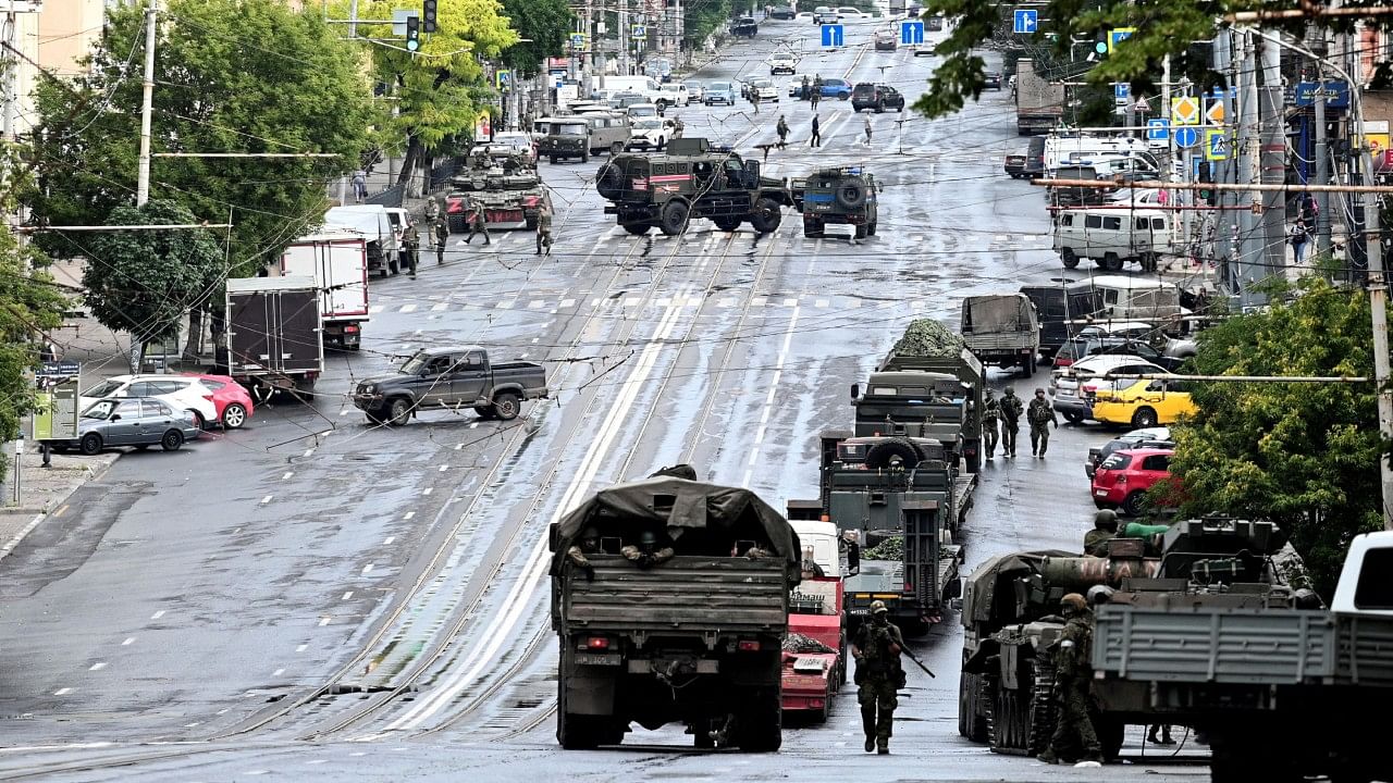 Fighters of Wagner private mercenary group are deployed in a street near the headquarters of the Southern Military District in the city of Rostov-on-Don. Credit: Reuters Photo