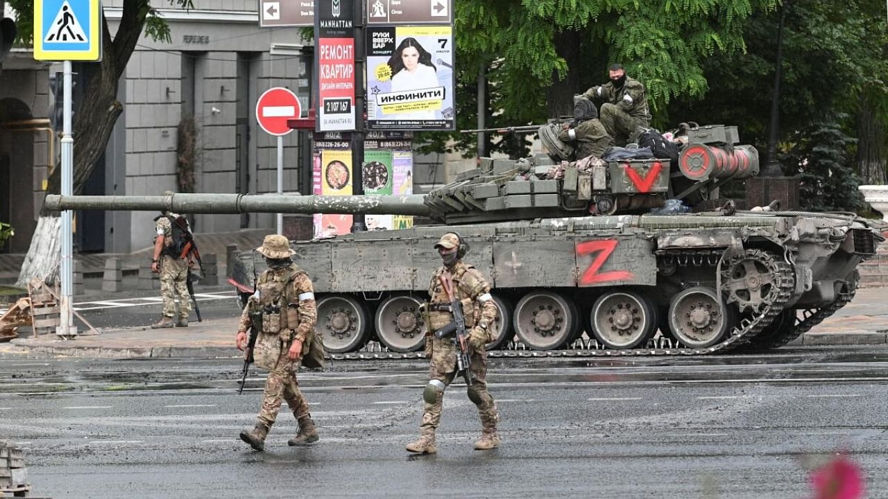 Fighters of Wagner private mercenary group are deployed in a street near the headquarters of the Southern Military District in the city of Rostov-on-Don, Russia, June 24, 2023. Credit: Reuters Photo