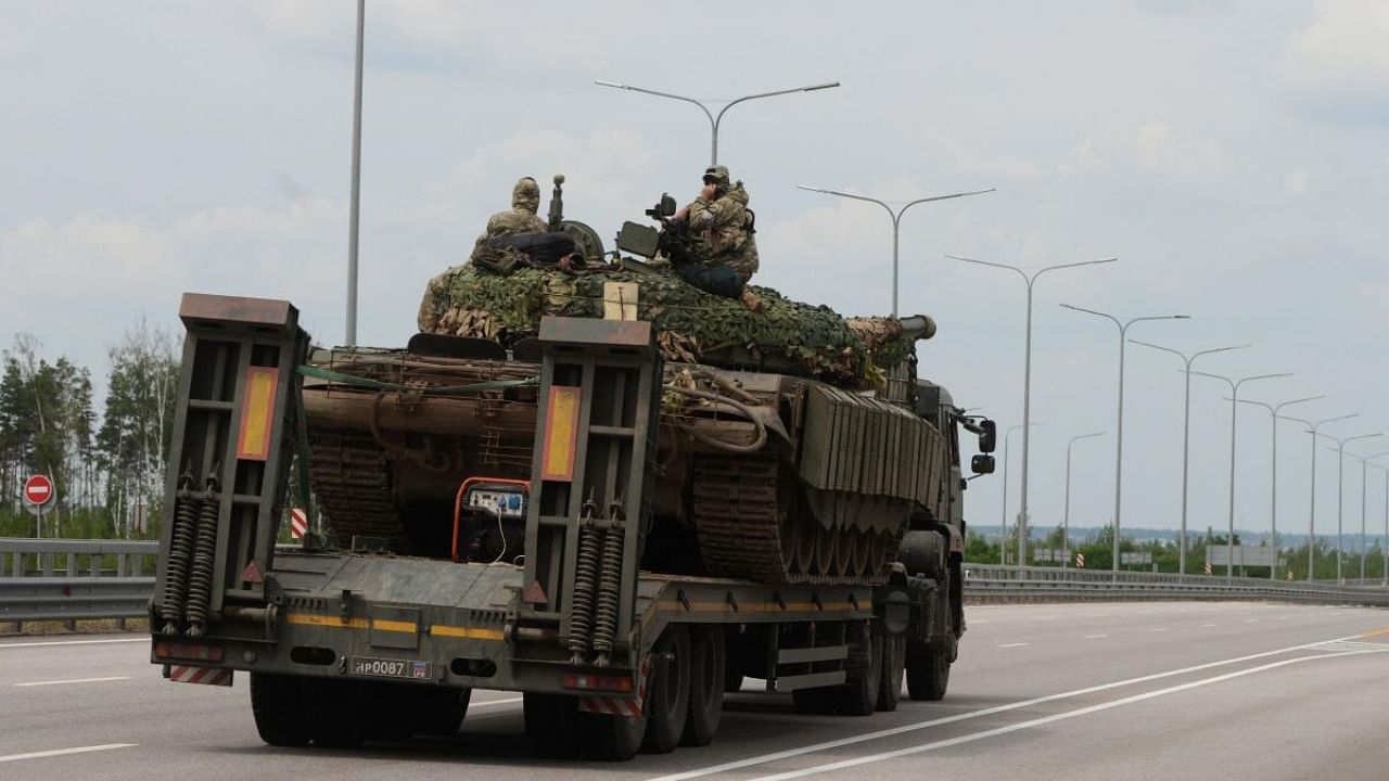 A truck transports a tank of Wagner private mercenary group along M-4 highway, which links the capital Moscow with Russia's southern cities, near Voronezh, Russia, June 24, 2023. Credit: Reuters Photo