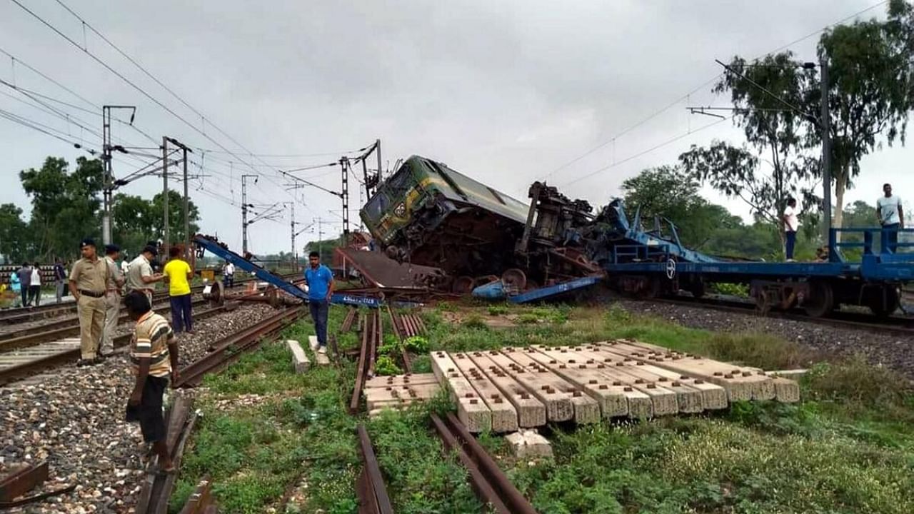 Police personnel inspect the site after two goods trains collided with each other that resulted in the derailment of several boggies near West Bengal's Bankura, in the wee hours of Sunday, June 25, 2023. Credit: PTI Photo