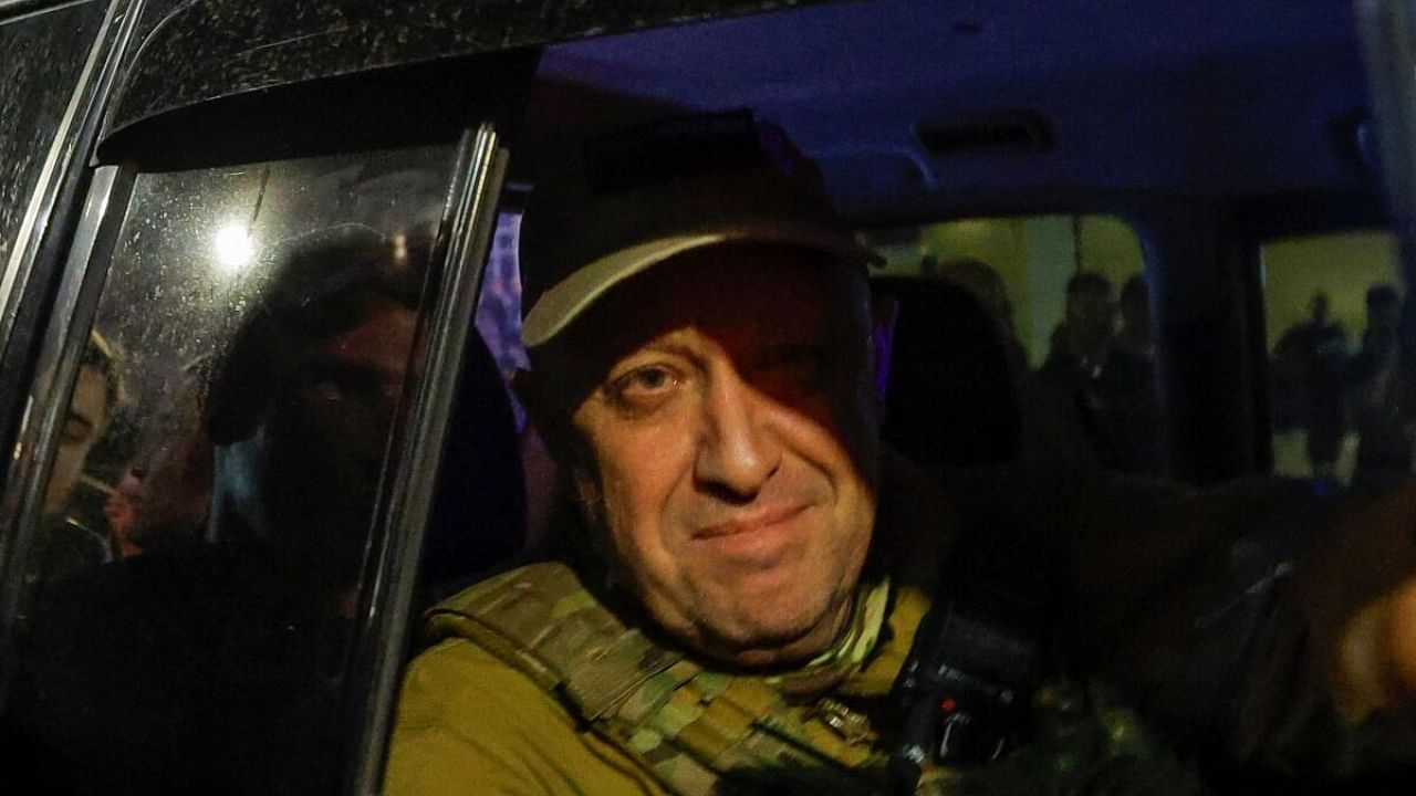 Wagner mercenary chief Yevgeny Prigozhin leaves the headquarters of the Southern Military District amid the group's pullout from the city of Rostov-on-Don, Russia. Credit: Reuters Photo