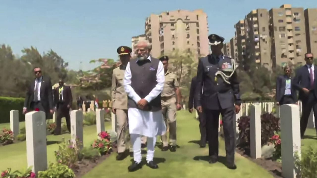 Prime Minister Narendra Modi during his visit to Heliopolis War Cemetery in Cairo, Egypt. Credit: PTI Photo