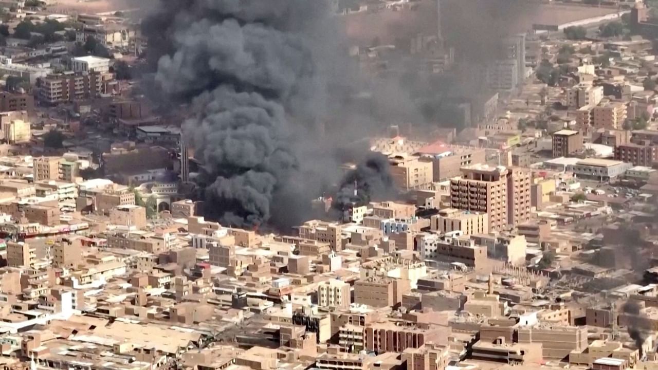 An aerial view of the black smoke and flames at a market in Omdurman, Khartoum North, Sudan, May 17, 2023 in this screengrab obtained from a handout video. Credit: Reuters Photo