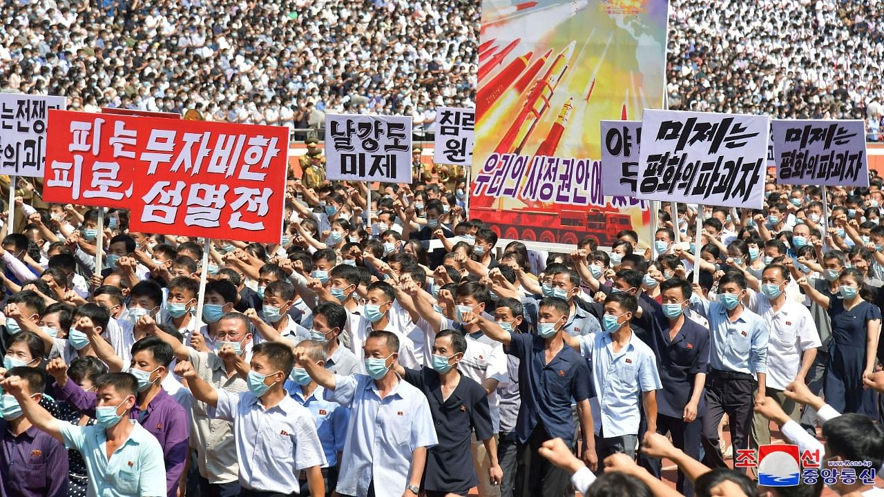 People attend a mass rally denouncing the US in Pyongyang. Credit: Reuters Photo