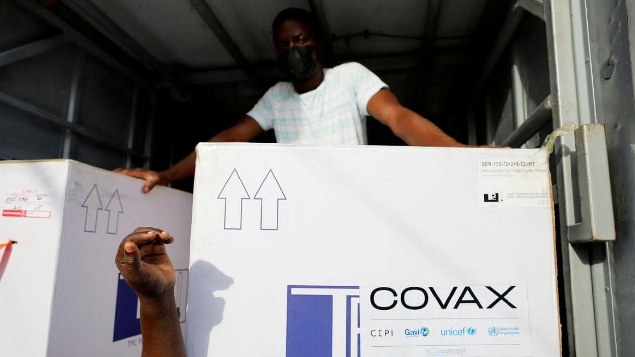 Boxes of coronavirus vaccines, redeployed from the Democratic Republic of Congo, arrive at a cold storage facility in Accra, Ghana. Credit: Reuters File Photo