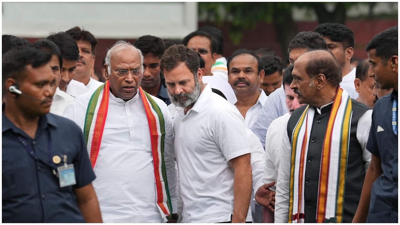 Congress President Mallikarjun Kharge with party leader Rahul Gandhi during a meeting where several former Bharat Rashtra Samithi (BRS) leaders joined Congress, at AICC headquarters, in New Delhi, Monday, June 26, 2023. Credit: PTI Photo