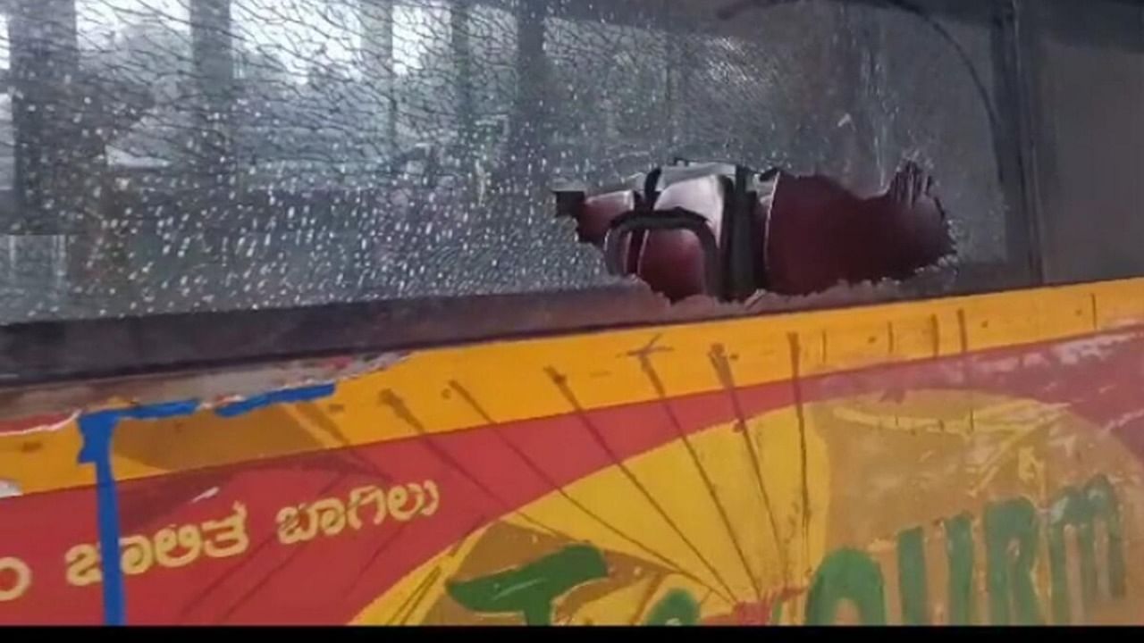 The damaged window glass of the KSRTC bus. Credit: Special Arrangement