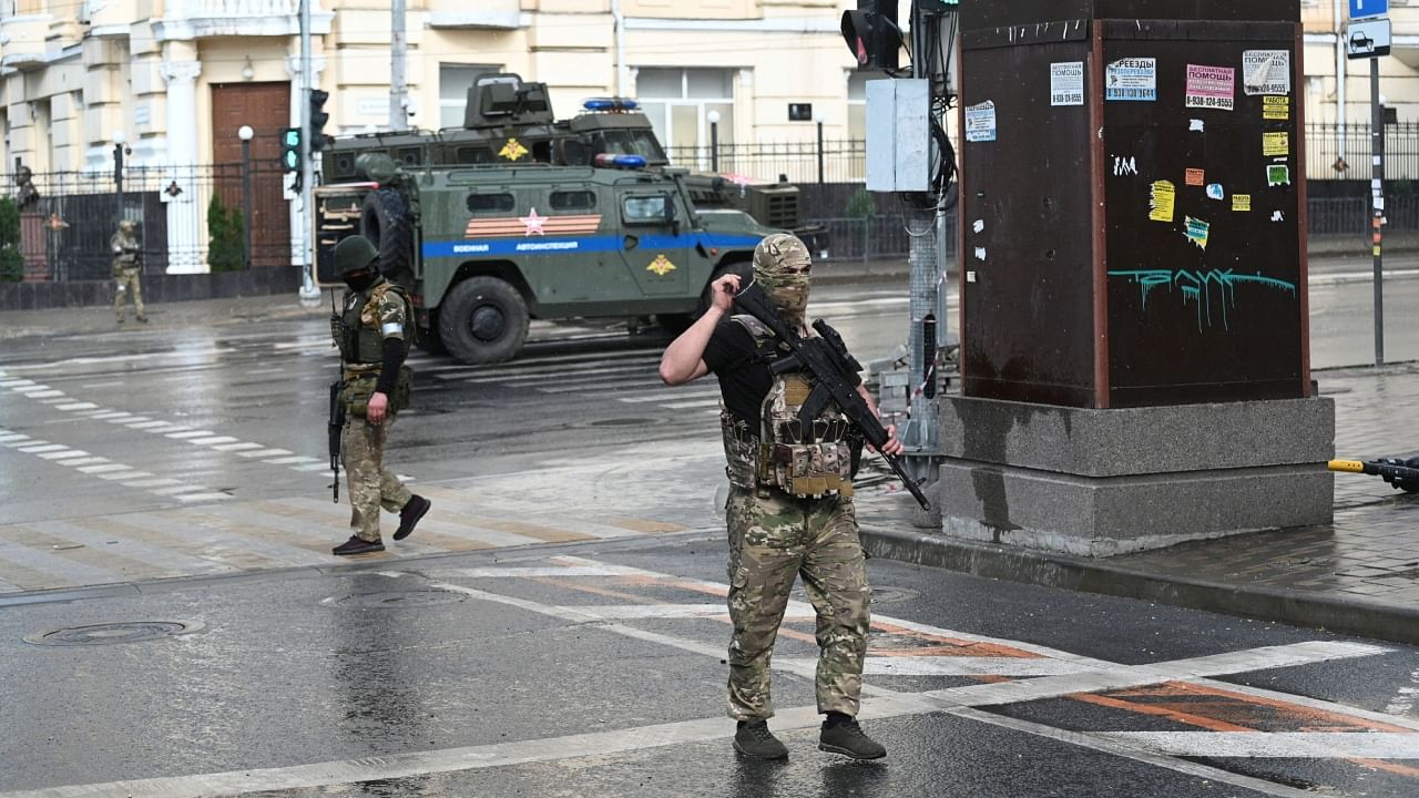 Fighters of Wagner private mercenary group are deployed in a street near the headquarters of the Southern Military District in the city of Rostov-on-Don. Credit: Reuters File Photo