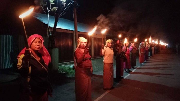 Torchlight vigil in response to Manipur crisis. Credit: PTI Photo