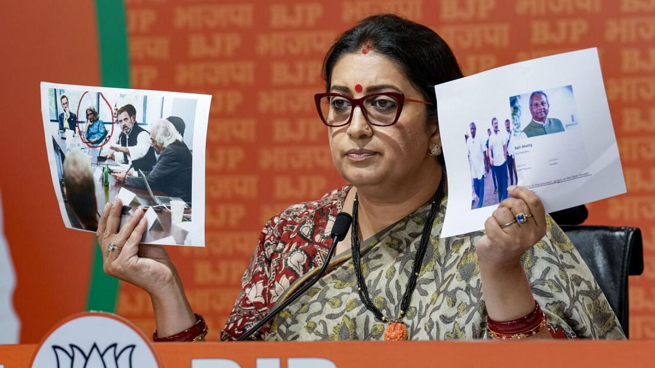 Smriti Irani addresses a press conference at the BJP headquarters, in New Delhi. Credit: PTI Photo