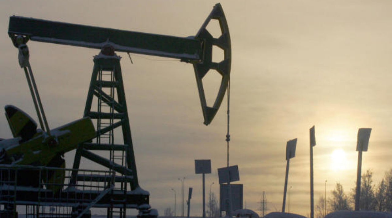 Yukos oil well is seen at sunset near the Russian northern city of Nefteyugansk. Credit: Reuters File Photo