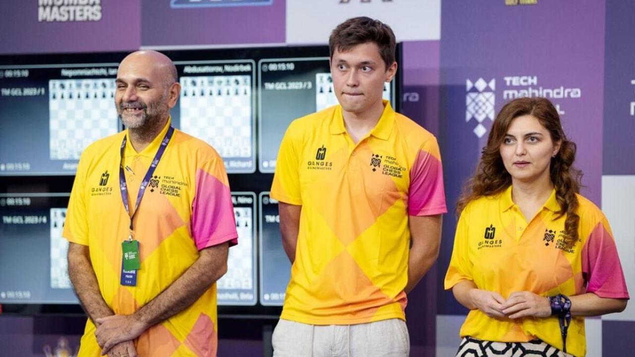 Pravin Thipsay (left), manager/ strategist of Ganges Grandmasters, is seen with players of his team Andrey Esipenko (centre) and Bella Khotenashvili at the event in Dubai. Credit: Special Arrangement