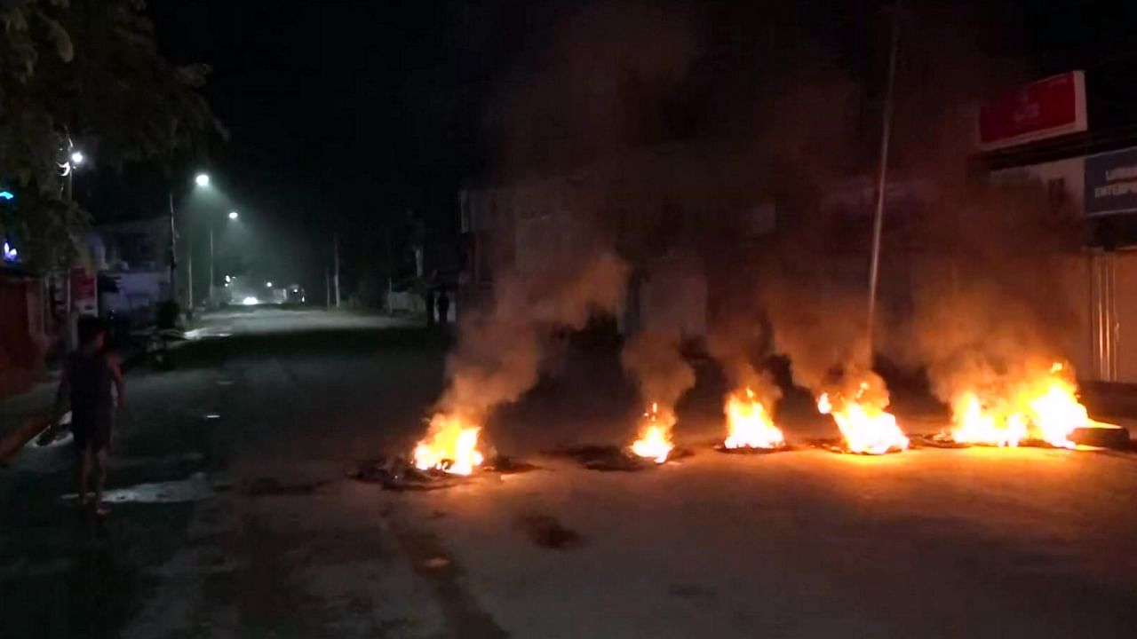 Tyres set on fire by miscreants amid fresh violence in Imphal. Credit: PTI Photo