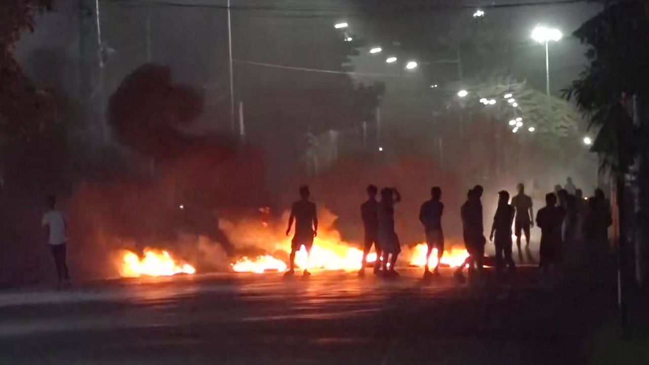 Tyres set on fire by miscreants amid fresh violence in Imphal. Credit: PTI Photo