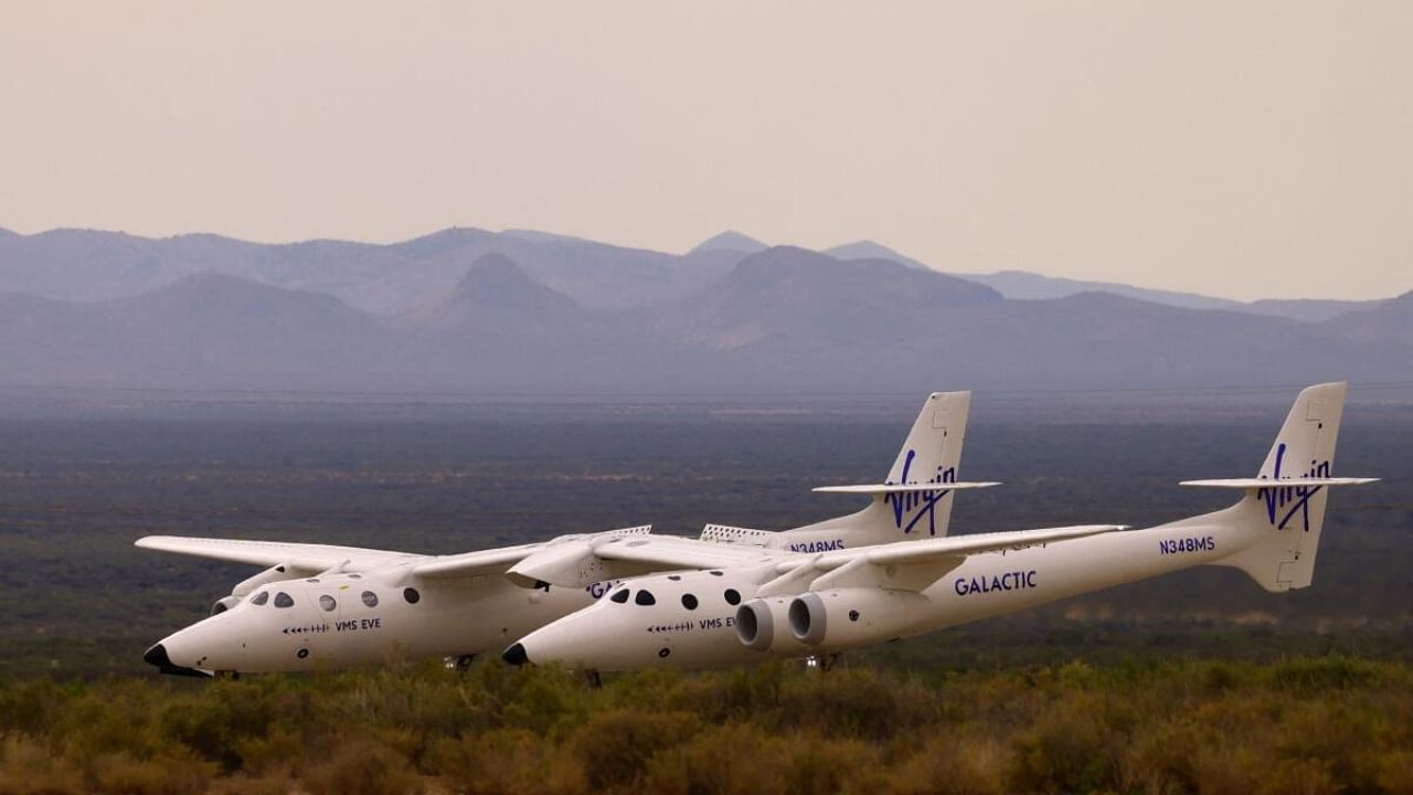 VMS Eve, operated by Virgin Galactic, returns after the company's first commercial flight to the edge of space, at the Spaceport America facility. Credit: Reuters Photo