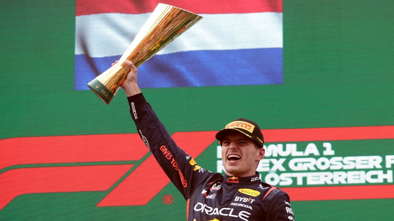 Max Verstappen celebrates with a trophy on the podium after winning the race at Red Bull Ring, Spielberg, Austria - July 2, 2023. Credit: Reuters Photo