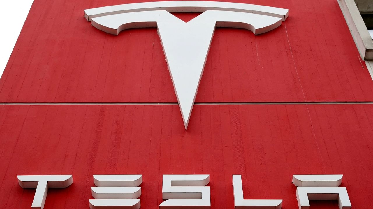 The logo of car manufacturer Tesla is seen at a branch office in Bern, Switzerland October 28, 2020. Credit; Reuters Photo