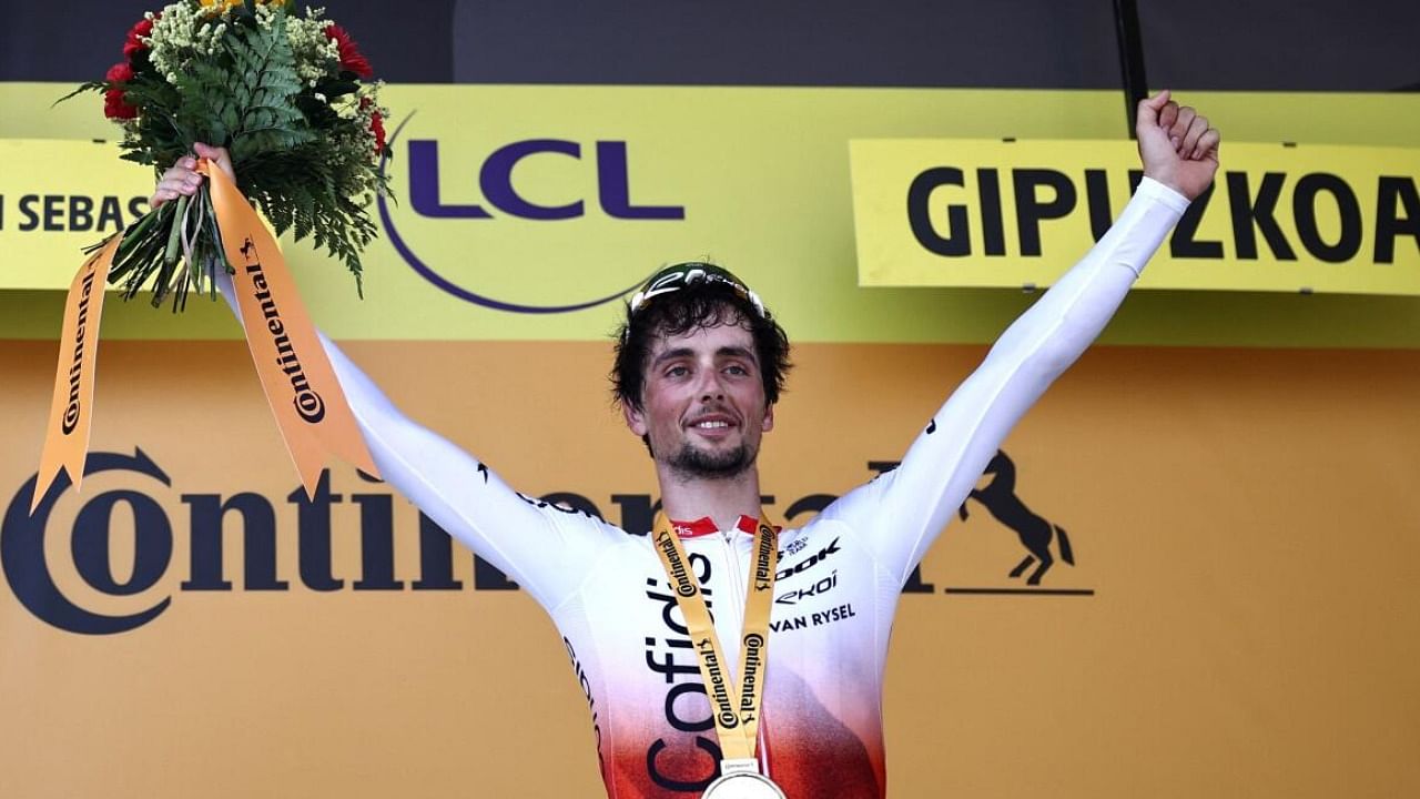 Cofidis' French rider Victor Lafay celebrates on the podium after winning the 2nd stage of the 110th edition of the Tour de France cycling race 208,9 km between Vitoria-Gasteiz and San Sebastian. credit: Reuters Photo