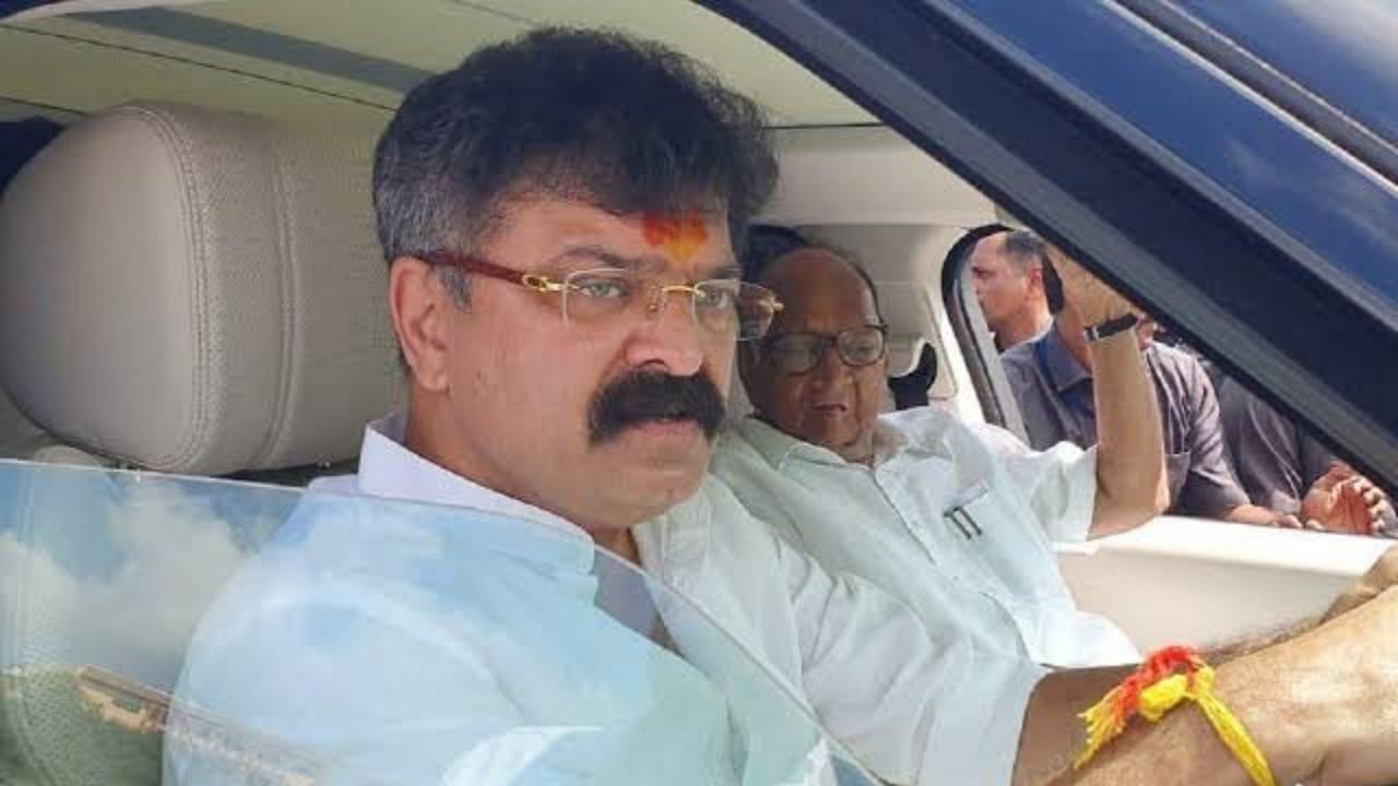 Dr Jitendra Awhad with NCP supremo Sharad Pawar. Credit: Twitter/@Awhadspeaks