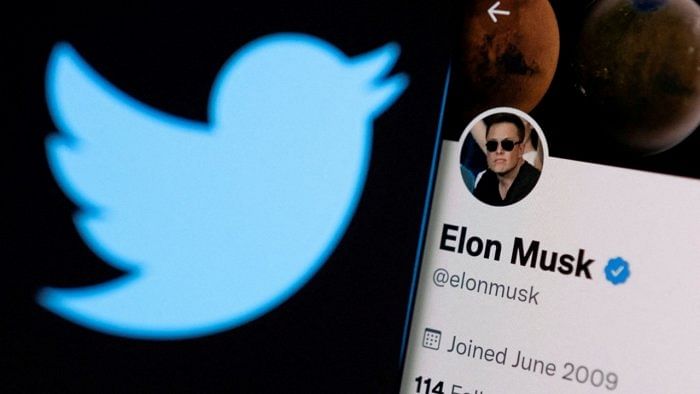 A photo illustration shows Elon Musk's twitter account and the Twitter logo. Credit: Reuters Photo