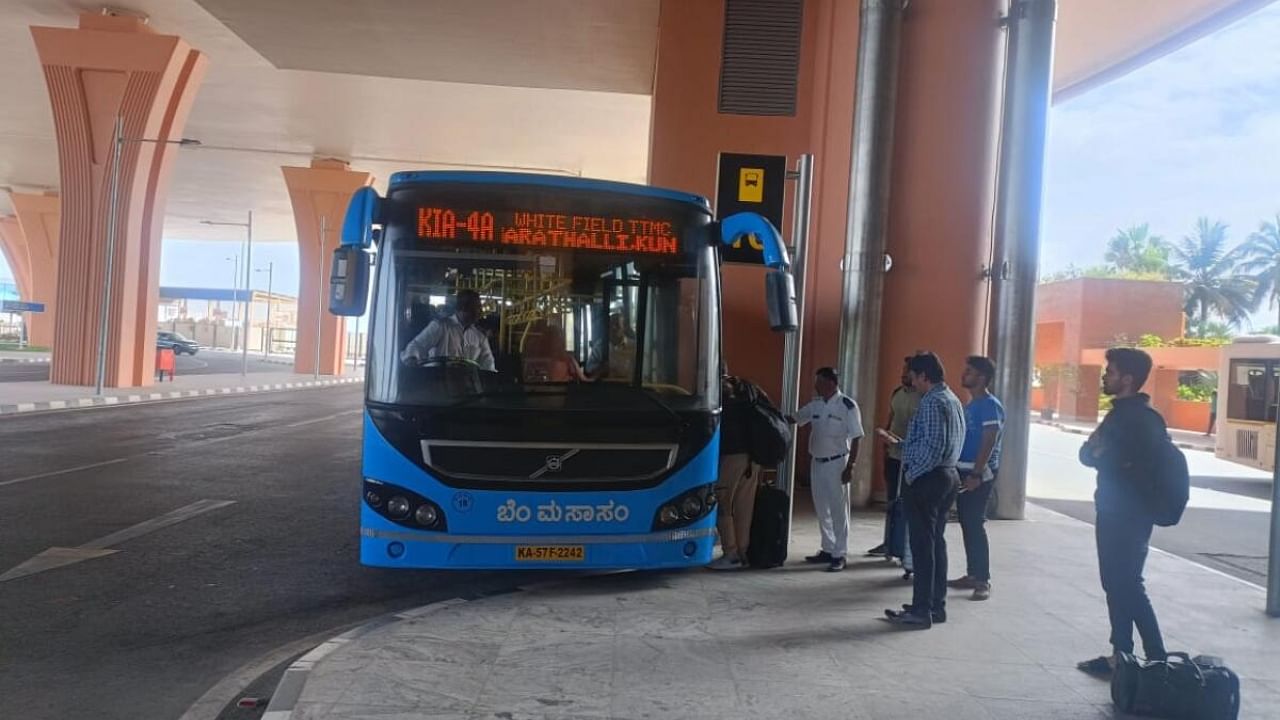 <div class="paragraphs"><p>Passengers board a BMTC bus outside Terminal 2 of the Kempegowda International Airport. </p></div>