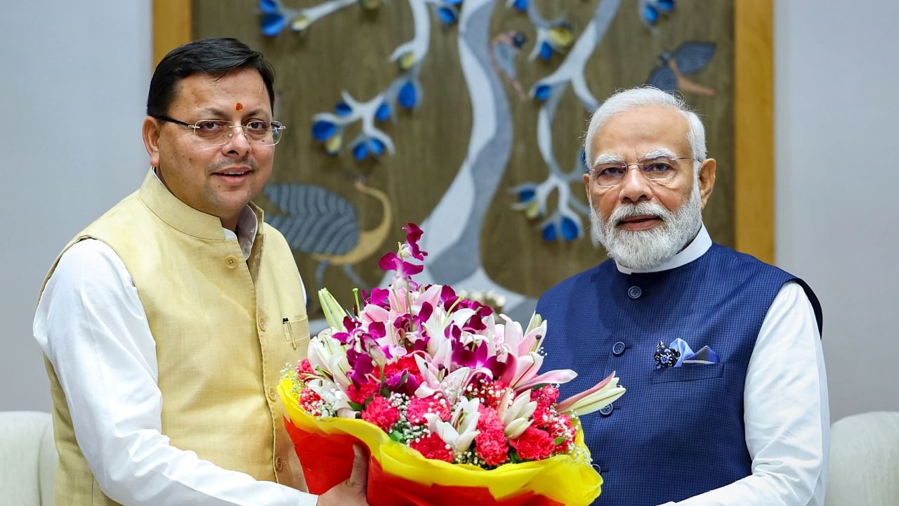 Prime Minister Narendra Modi in a meeting with Uttarakhand Chief Minister Pushkar Singh Dhami, in New Delhi, Tuesday, July 4, 2023. Credit: PTI Photo