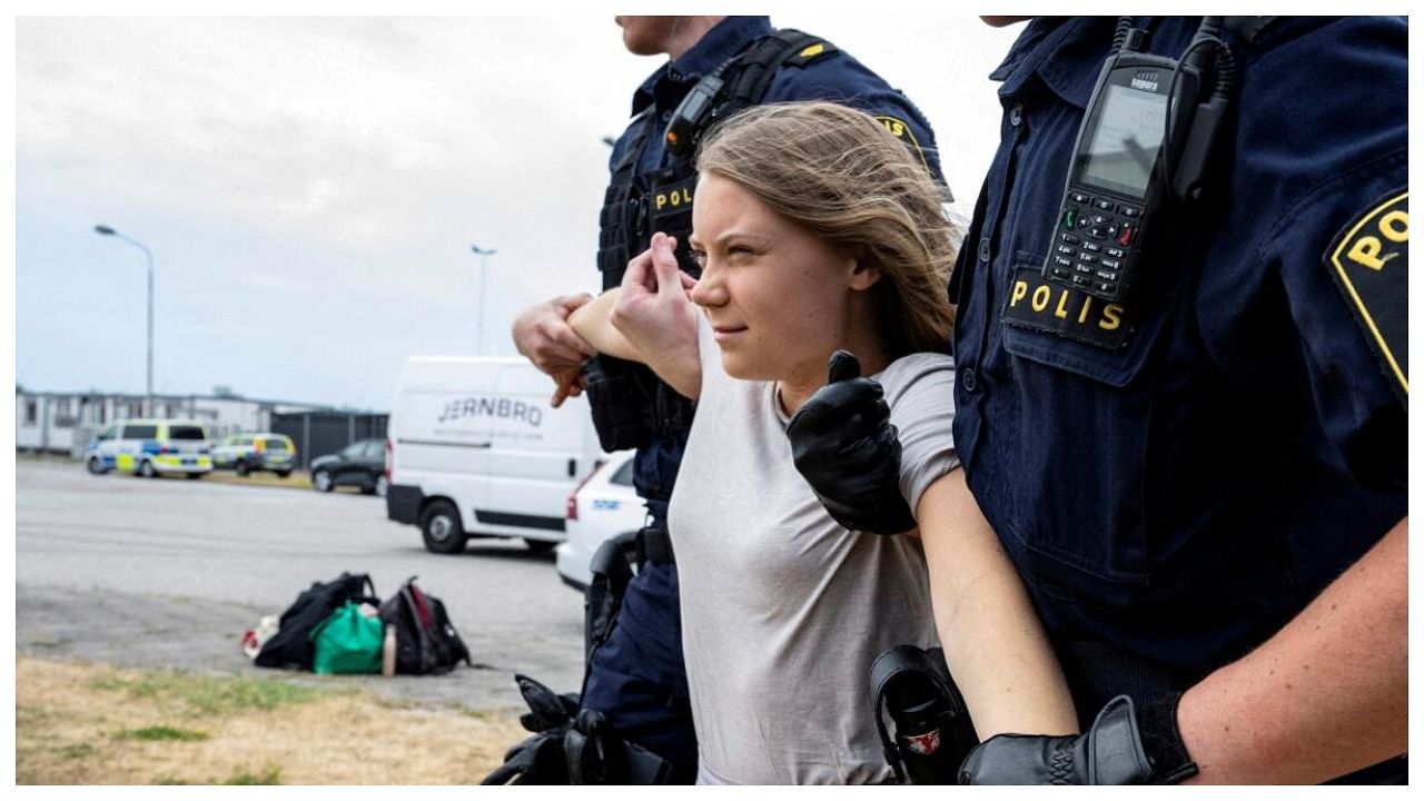 <div class="paragraphs"><p>Police remove Greta Thunberg as they move climate activists who are blocking the entrance to Oljehamnen in Malmo. </p></div>