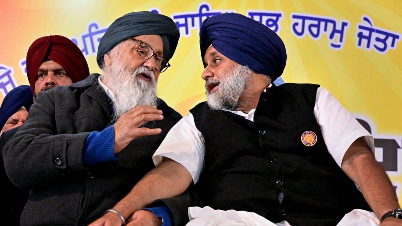 Parkash Singh Badal (L) and Sukhbir Singh Badal (R). Credit: PTI File Photo