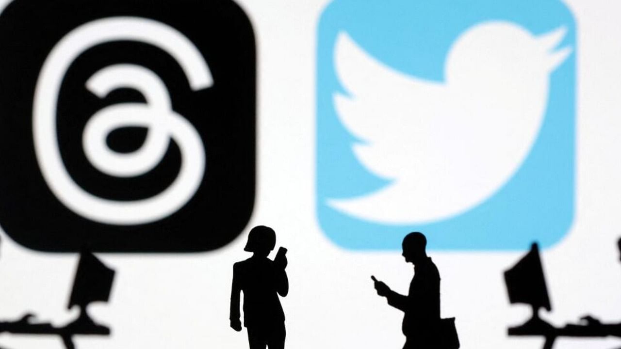 Illustration shows Meta Threads and Twitter app logos. Credit: Reuters Photo