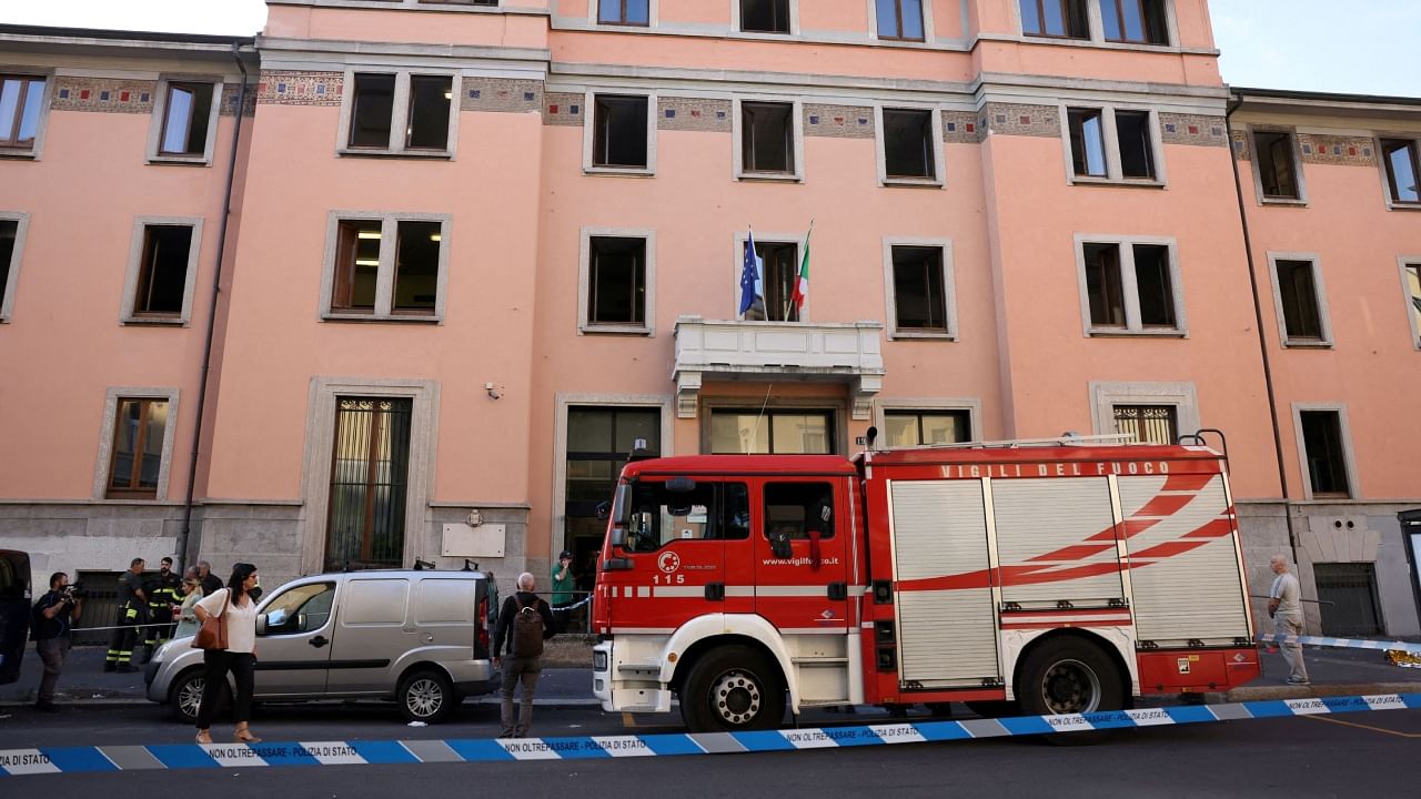 Firefighters work at the scene following a fire in a retirement home in Milan, Italy. Credit: Reuters Photo