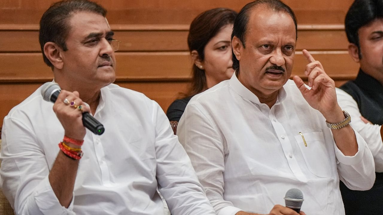 Maharashtra Deputy Chief Minister Ajit Pawar with Praful Patel and others during a press conference. Credit: PTI File Photo