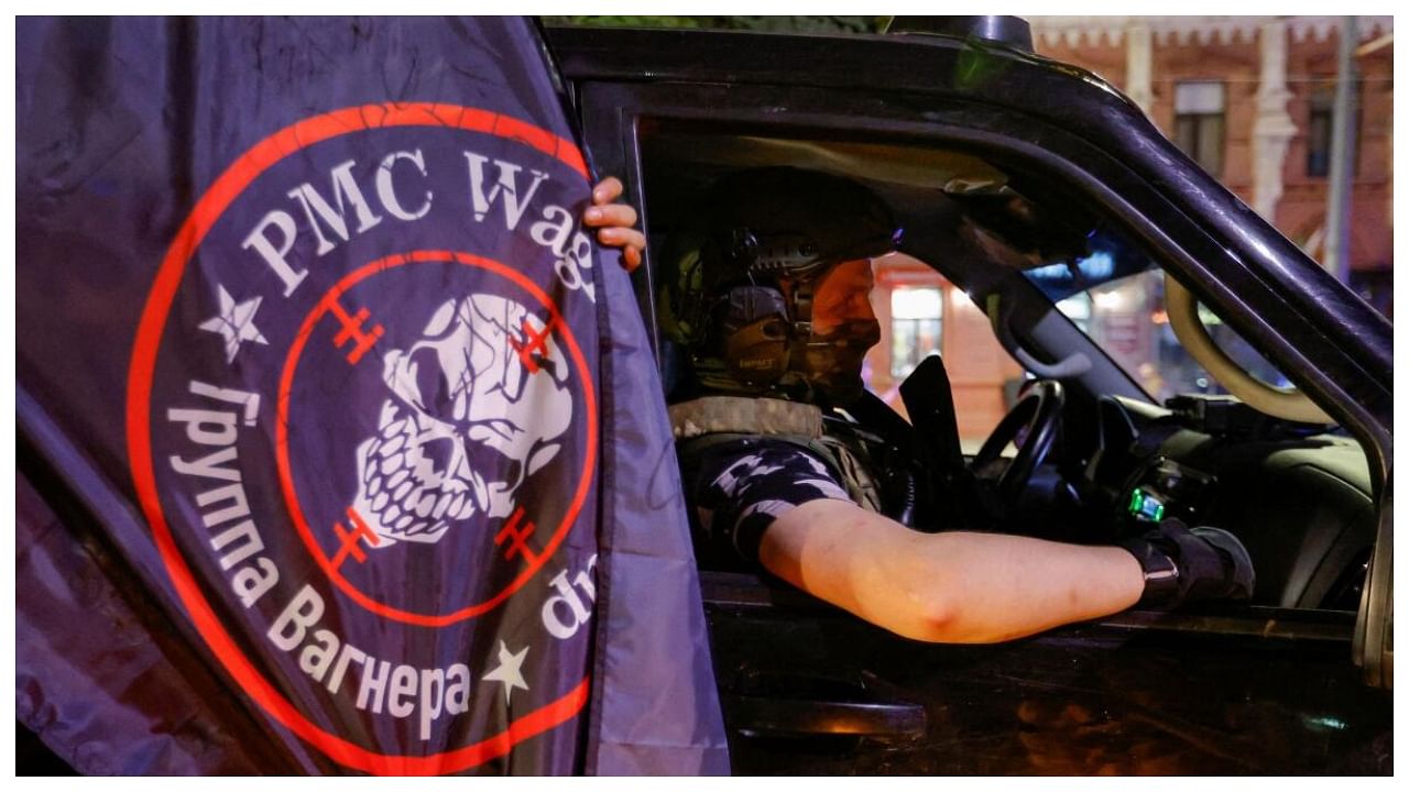 Fighters of Wagner private mercenary group pull out of the headquarters of the Southern Military District to return to base, in the city of Rostov-on-Don, Russia, June 24, 2023. Credit: Reuters Photo