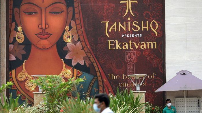 People are seen outside a Tanishq jewellery store in Mumbai. Credit: Reuters Photo