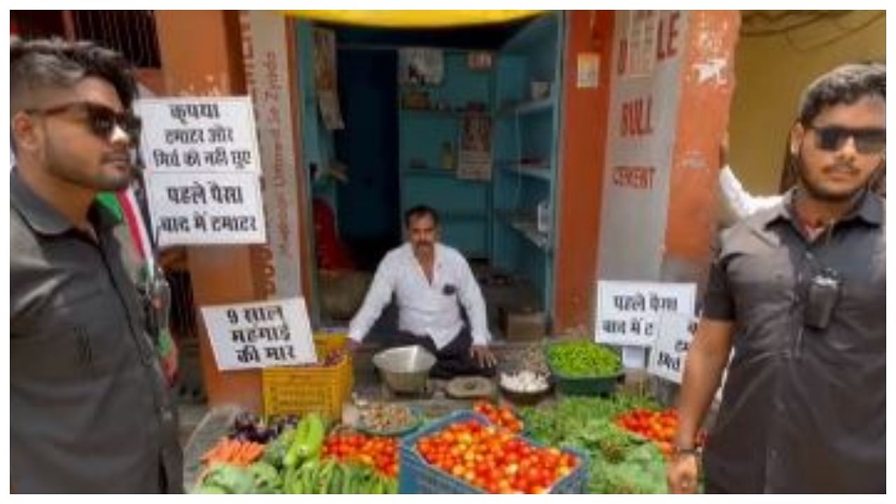 Screengrab from the video which features bouncers 'guarding' tomatoes in Varanasi. Credit: Twitter/@PTI_News