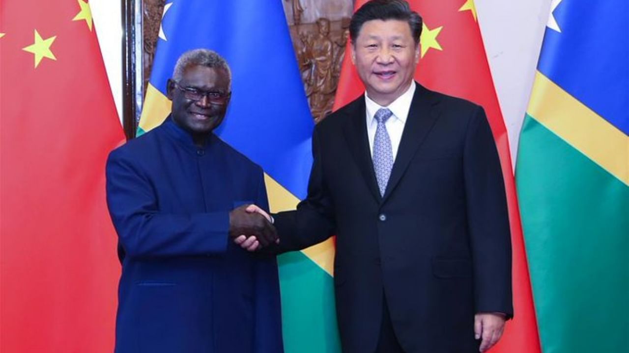 <div class="paragraphs"><p>Solomon Islands PM Manasseh Sogavare with China's President Xi Jinping. </p></div>