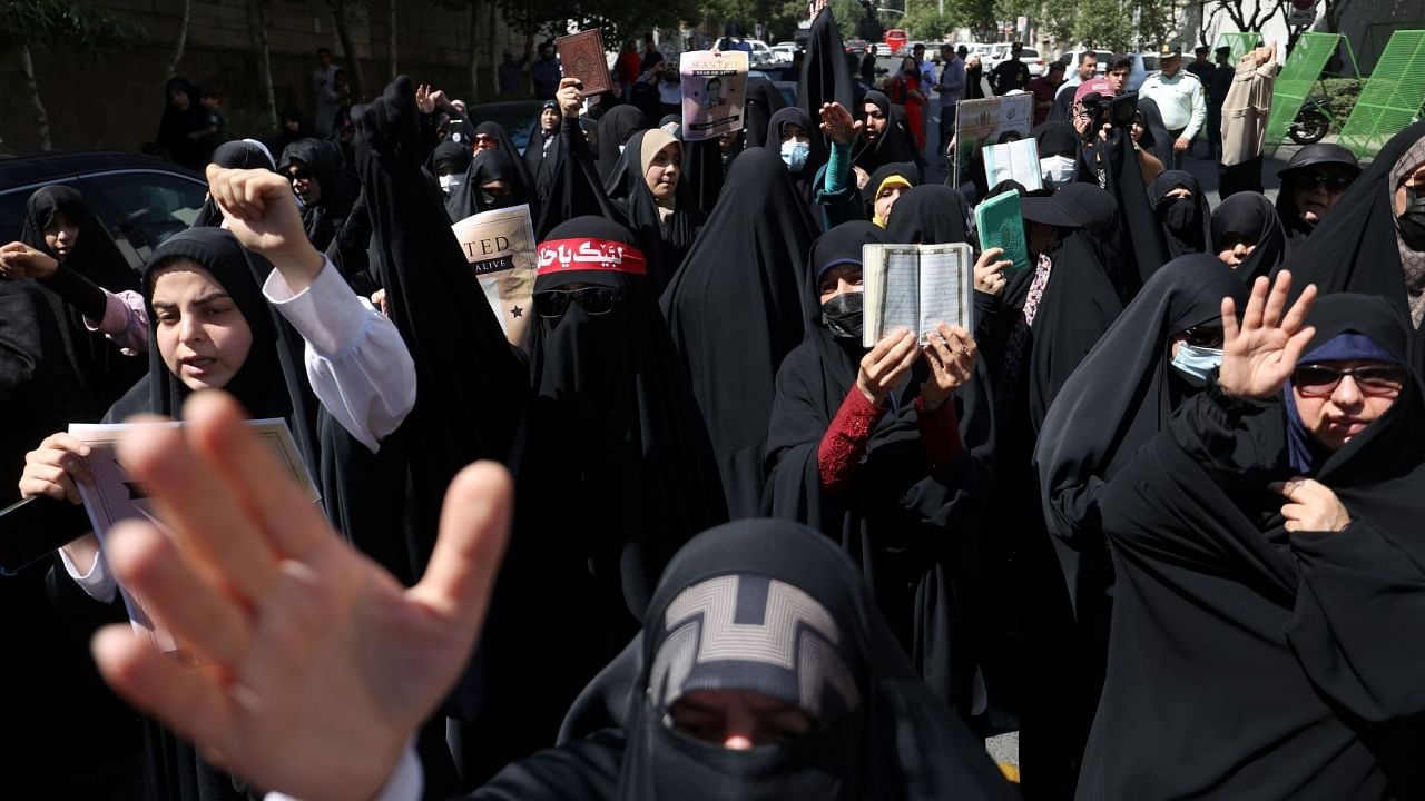 Demonstrators take part in a protest, against a man who burned a copy of the Quran outside a mosque in the Swedish capital Stockholm, in front of the Swedish Embassy in Tehran, Iran June 30, 2023. Credit: Majid Asgaripour/WANA (West Asia News Agency) via Reuters Phot