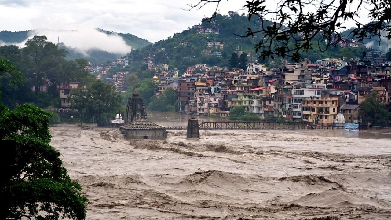 Submerged Panchvaktra Temple in swollen Beas river due to heavy monsoon rainfall, in Mandi district. Credit: PTI Photo