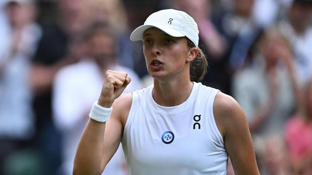 Poland's Iga Swiatek celebrates winning her fourth round match against Switzerland's Belinda. Credit: Reuters Photo