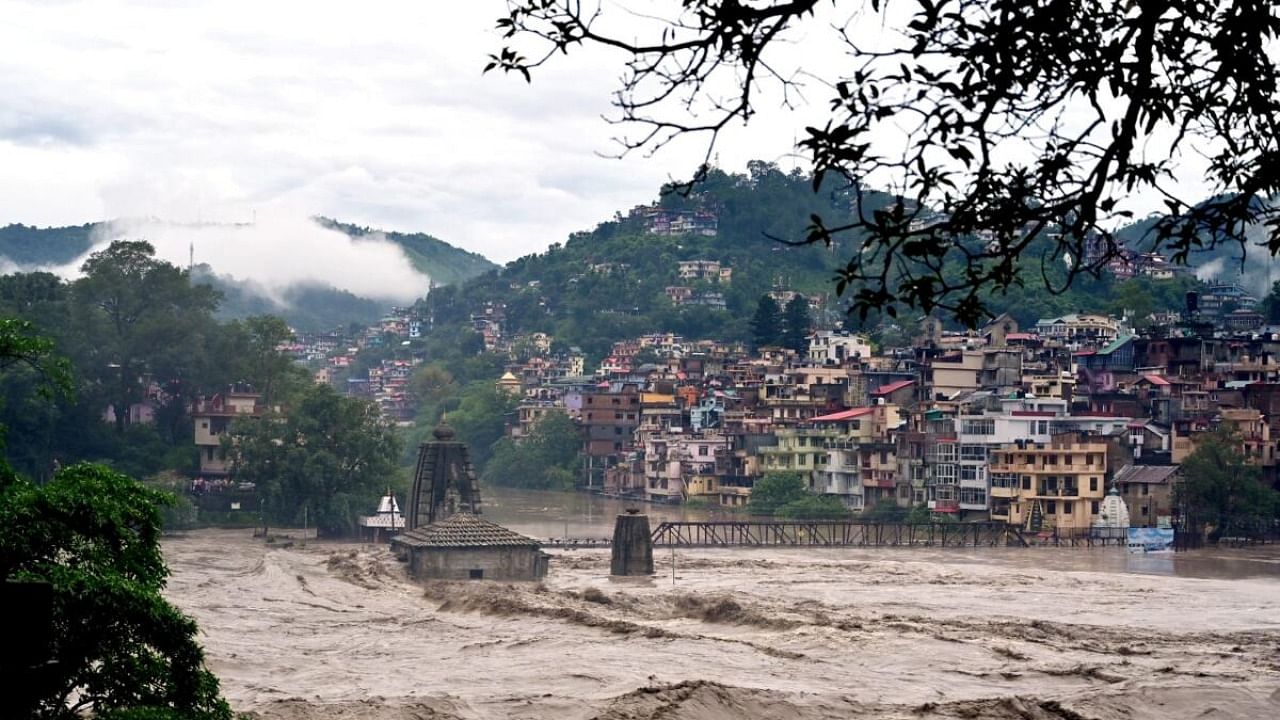 Submerged Panchvaktra Temple in swollen Beas river due to heavy monsoon rainfall, in Mandi district, Sunday, July 9, 2023. Credit: PTI Photo