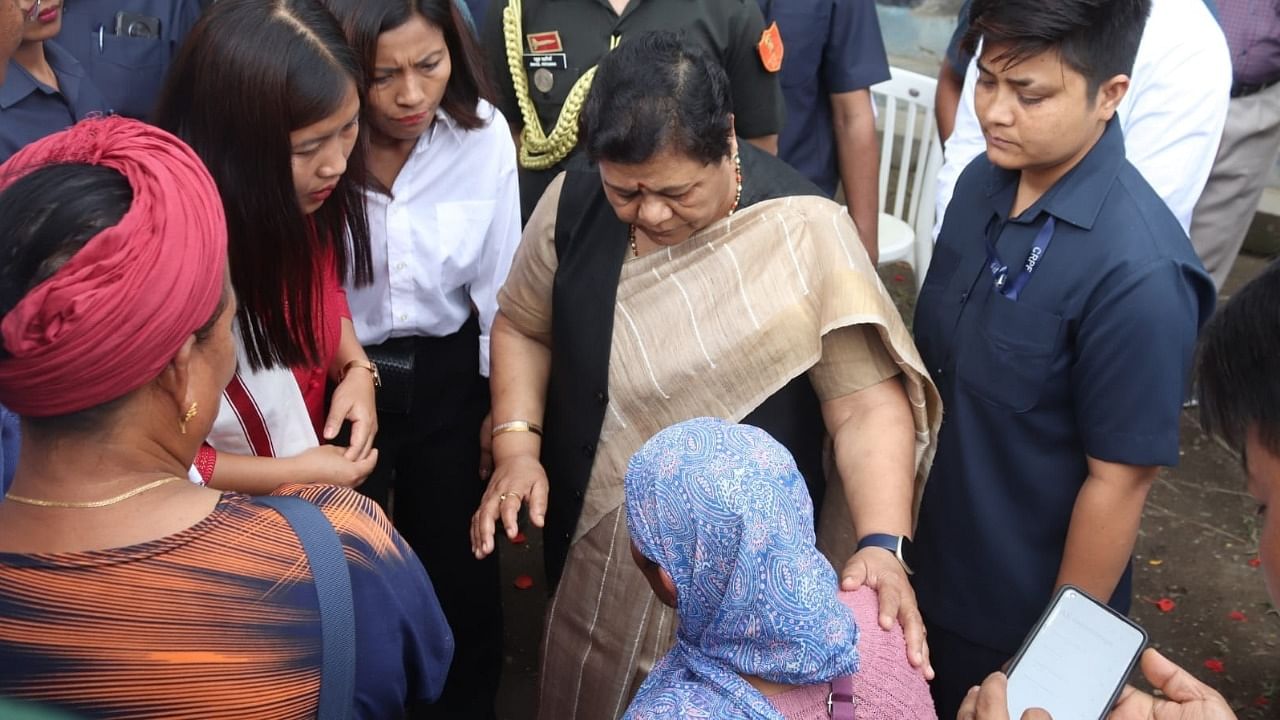 Governor of Manipur Anusuiya Uikey interacts with violence affected people during her visit to different relief centres in Bishnupur and Churachandpur districts. Credit: IANS Photo