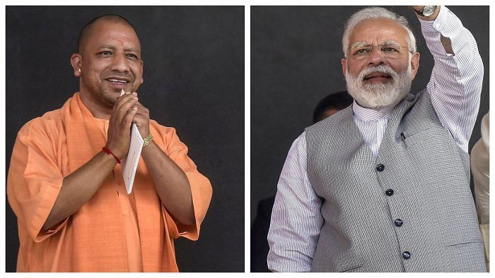 Yogi Adityanath(L) and PM Narendra Modi. Credit: PTI Photo