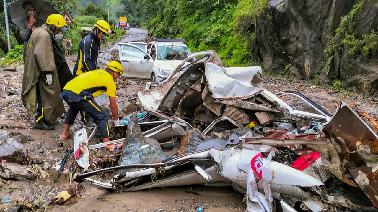 State Disaster Response Force (SDRF) personnel during a rescue and relief operation after vehicles were hit by falling debris after rain-triggered landslide on Uttarkashi-Gangotri highway, in Uttarkashi district, Tuesday, July 11, 2023. Credit: PTI Photo