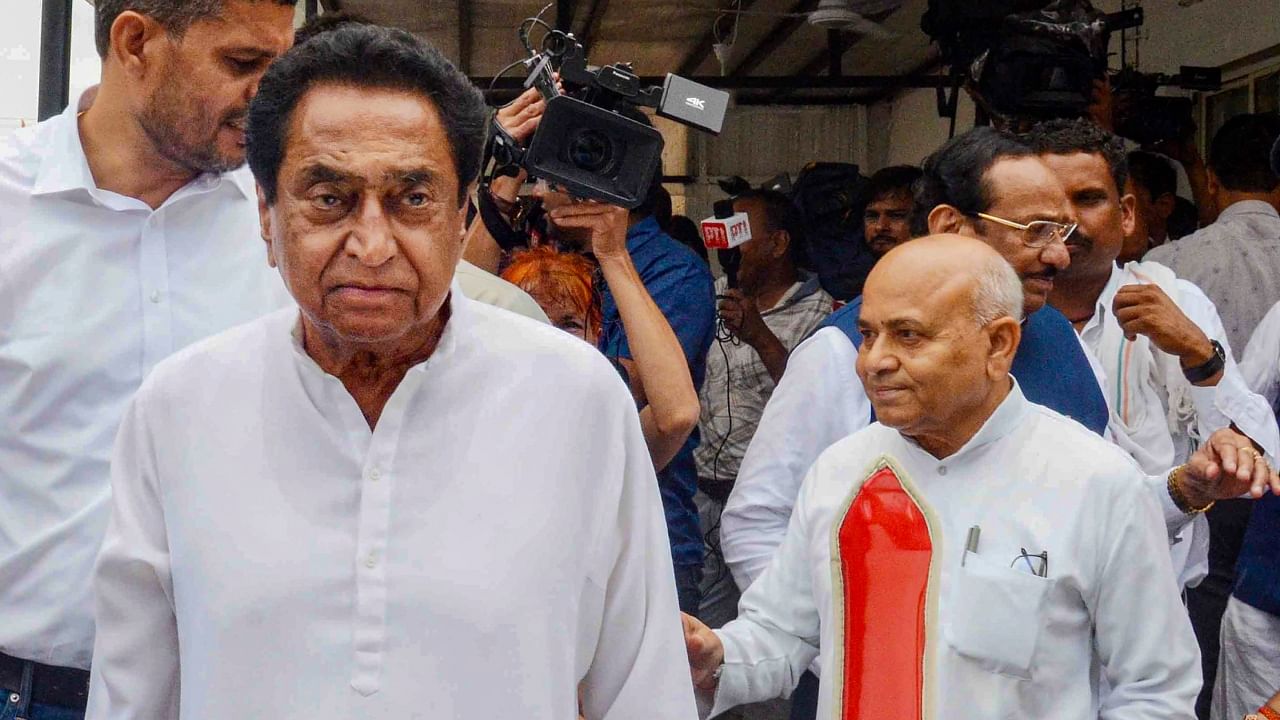 Madhya Pradesh Congress President Kamal Nath along with Leader of Opposition in MP Assembly Govind Singh. Credit: PTI Photo