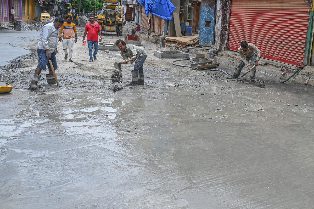 Works on laying the footpaths and beautification of the lanes will be completed soon. DH PHOTO/S K DINESH 