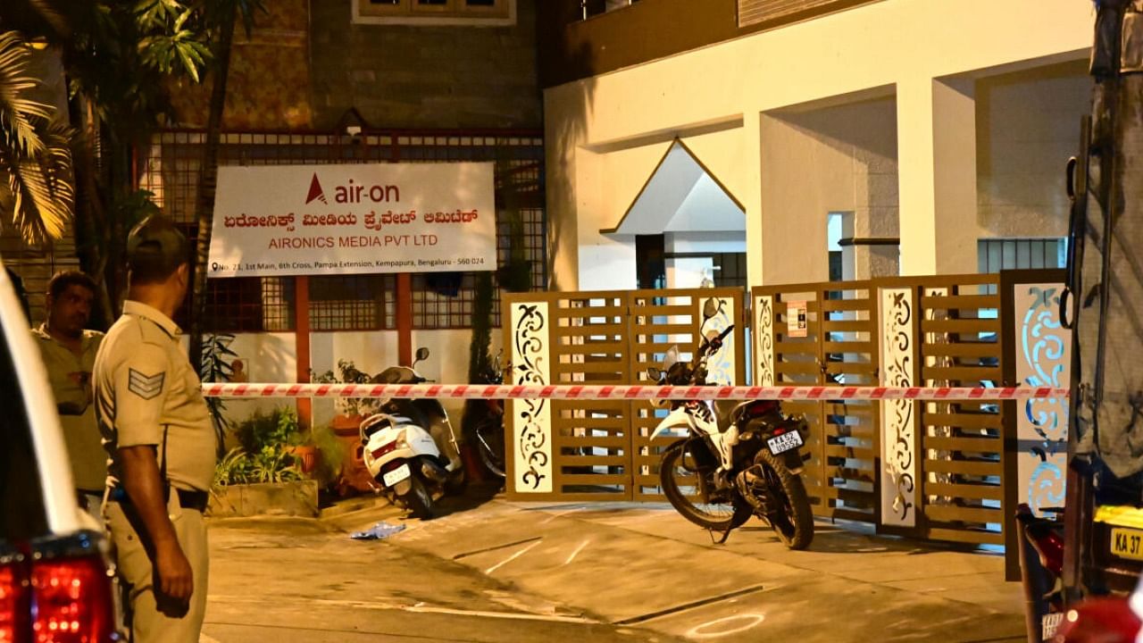 Cops outside fiber net company Aironics Media Pvt Ltd were hacked to death by three-member gang at Pampa Extension, Hebbal in Bengaluru. Credit: DH Photo/B K Janardhan
